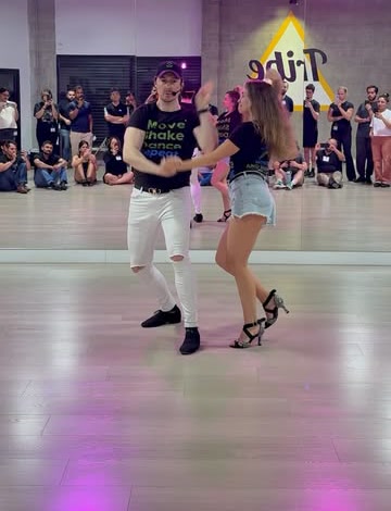 Inna dancing a salsa demo in the studio